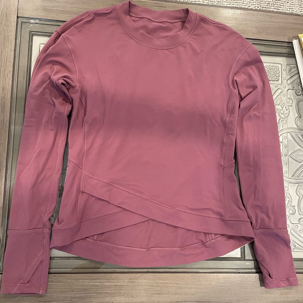 Lulu Lemon mauve top in a Medium.